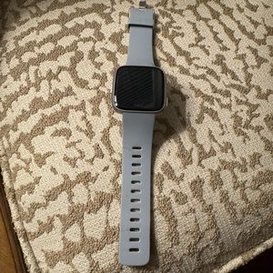 Used Fitbit Versa with S/M wristband
